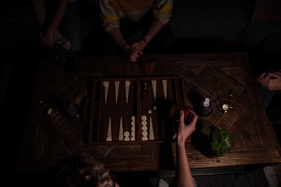 Two Person Playing Backgammon, board game, close-up, dark, hands HD wallpaper