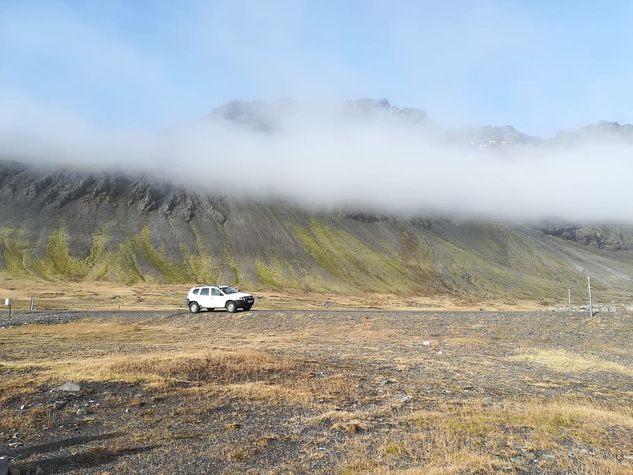 white SUV running on soil over clouds, nature, outdoors, road
