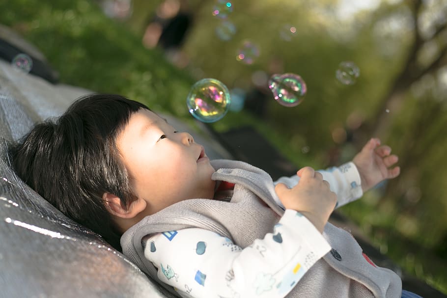 human, person, bubble, face, baby, finger, child, kid, clothing HD wallpaper