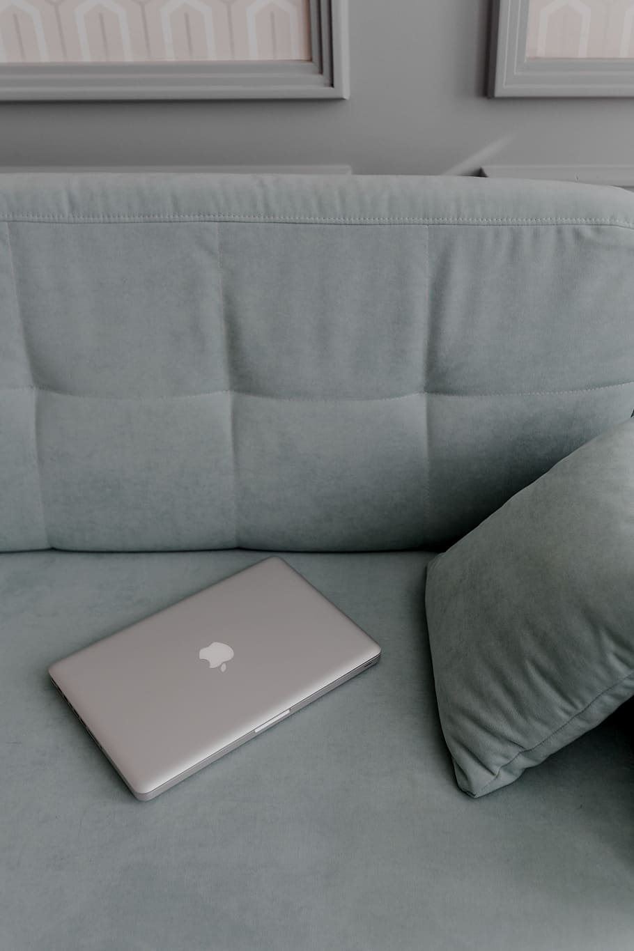 MacBook laptop lying on mint couch, interior, minimal, minimalist HD wallpaper
