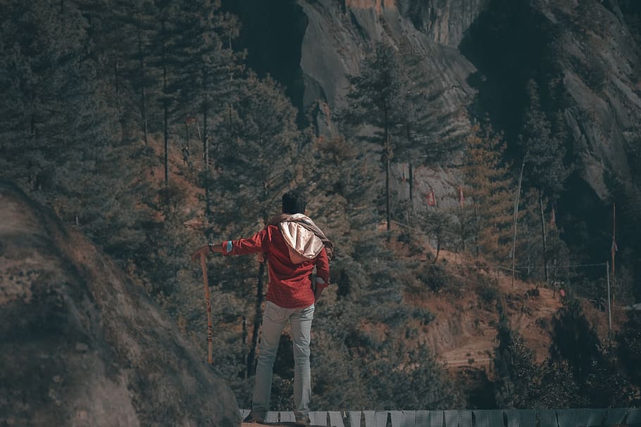 man standing on top of rock, monastery, travel, adventure, trekker, HD wallpaper