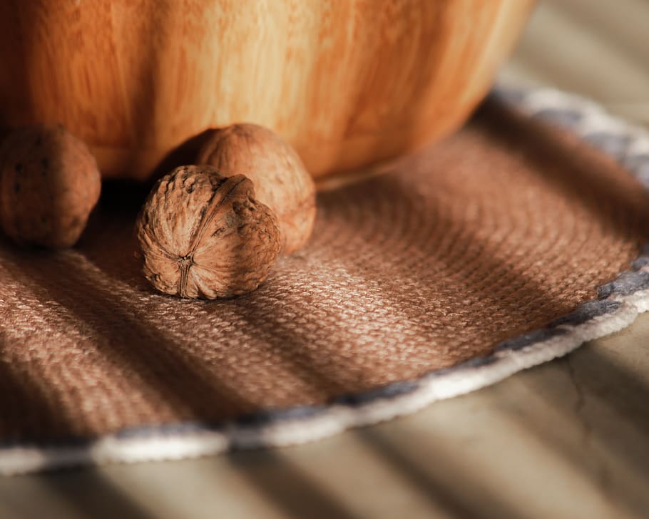 brown walnut on brown textile, food and drink, healthy eating HD wallpaper