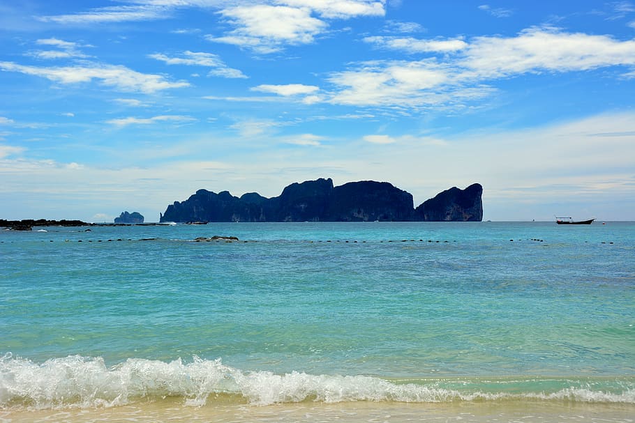 Boat Near Island on Body of Water, beach, clouds, daylight, horizon HD wallpaper