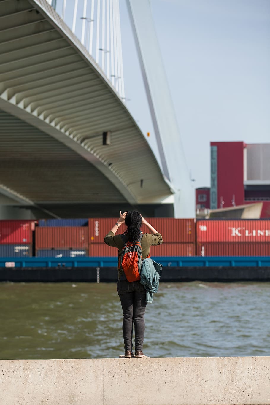 woman taking photo of bridge, person, human, people, shipping container, HD wallpaper