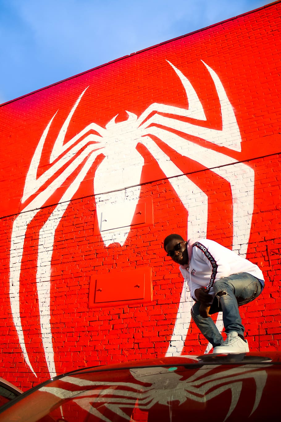 man standing in front of Spider-Man wall, men, day, red, architecture, HD wallpaper