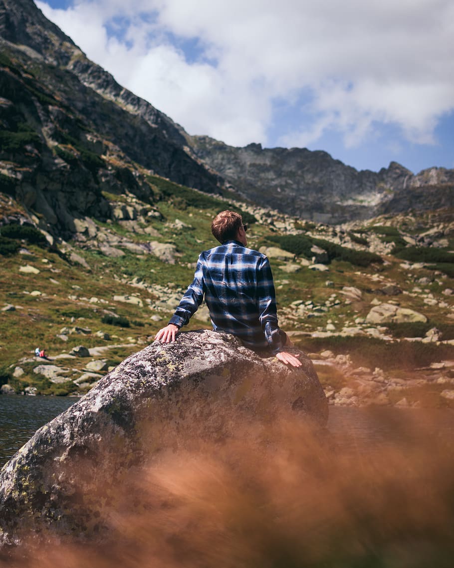 man sitting on rock, mountain, leisure activity, one person, lifestyles HD wallpaper