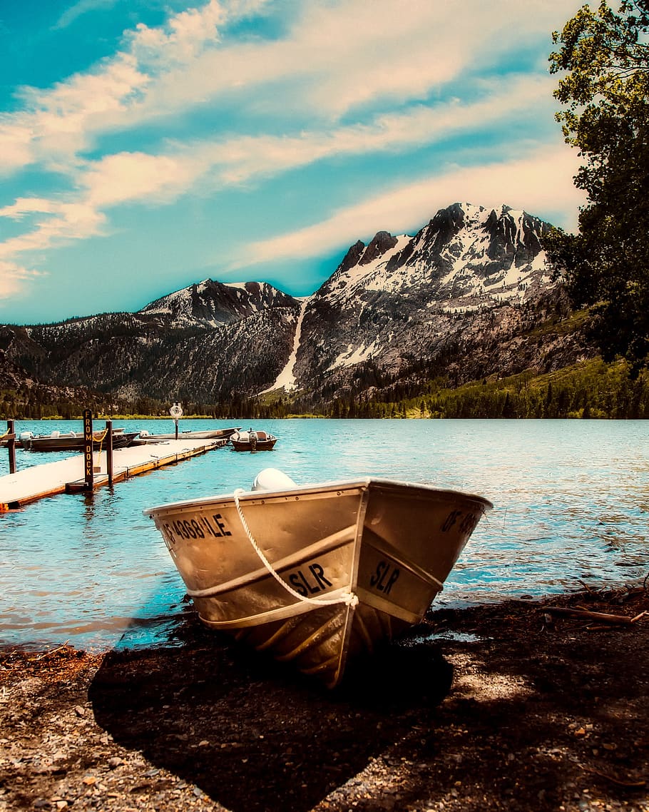 Beige Boat Beside Sea Dock, clouds, forest, idyllic, mountains HD wallpaper