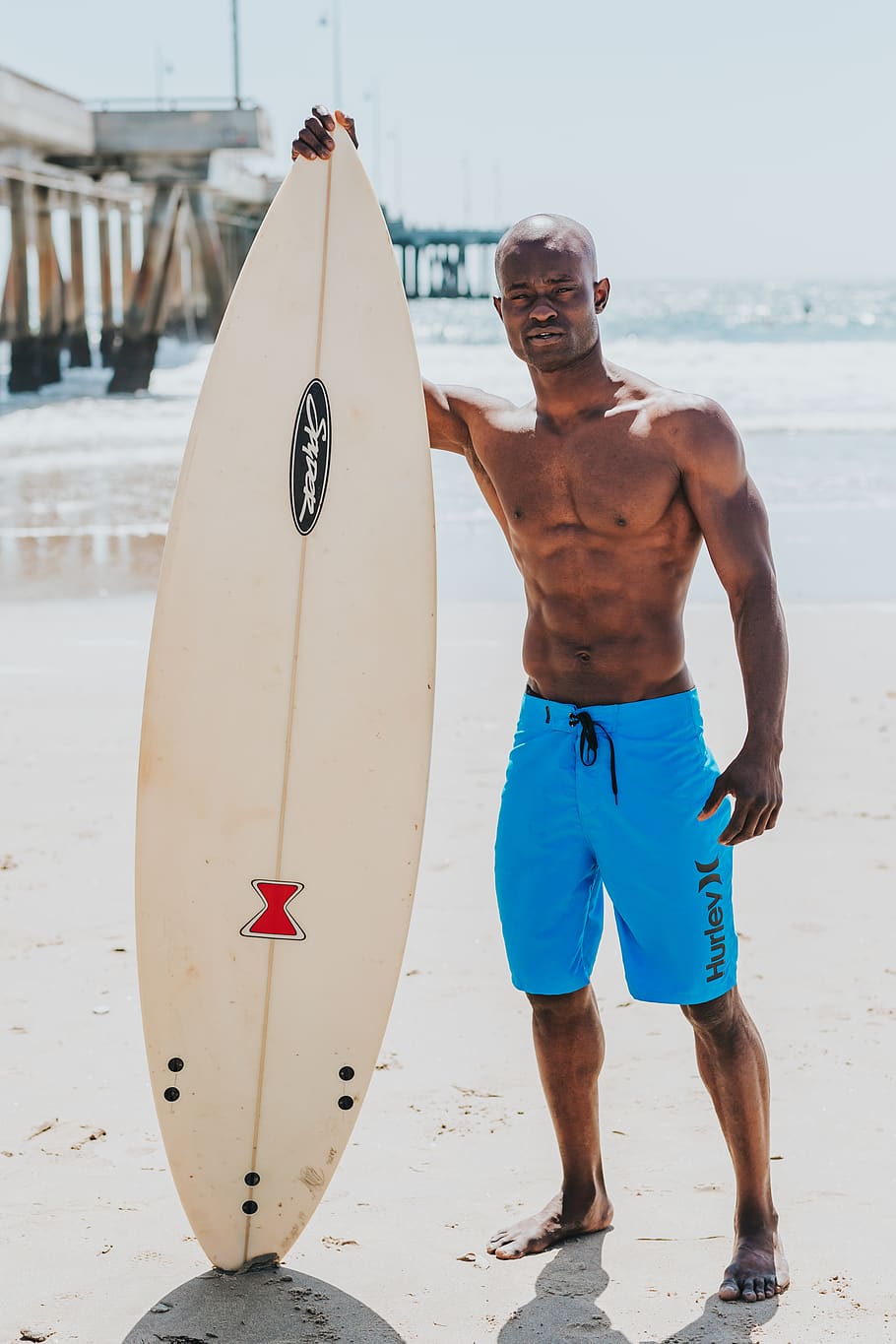 man standing beside white surfboard, ocean, water, outdoors, nature, HD wallpaper