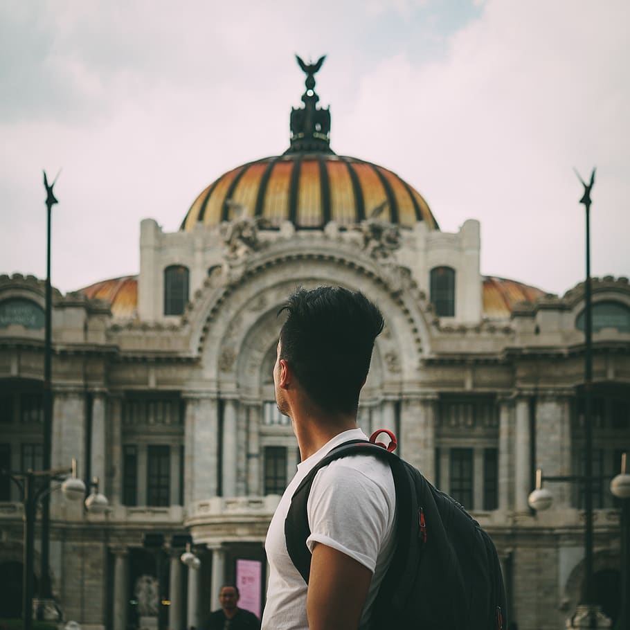 Man Standing Near Building, architecture, person, building exterior HD wallpaper