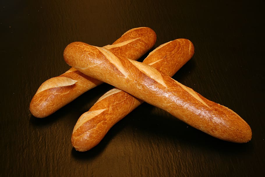 Three Baked Breads on Brown Surface, blur, bun, close-up, delicious HD wallpaper