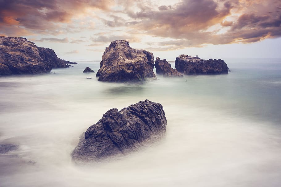 Brown Rock Formations, adventure, beach, beauty, clouds, environment HD wallpaper