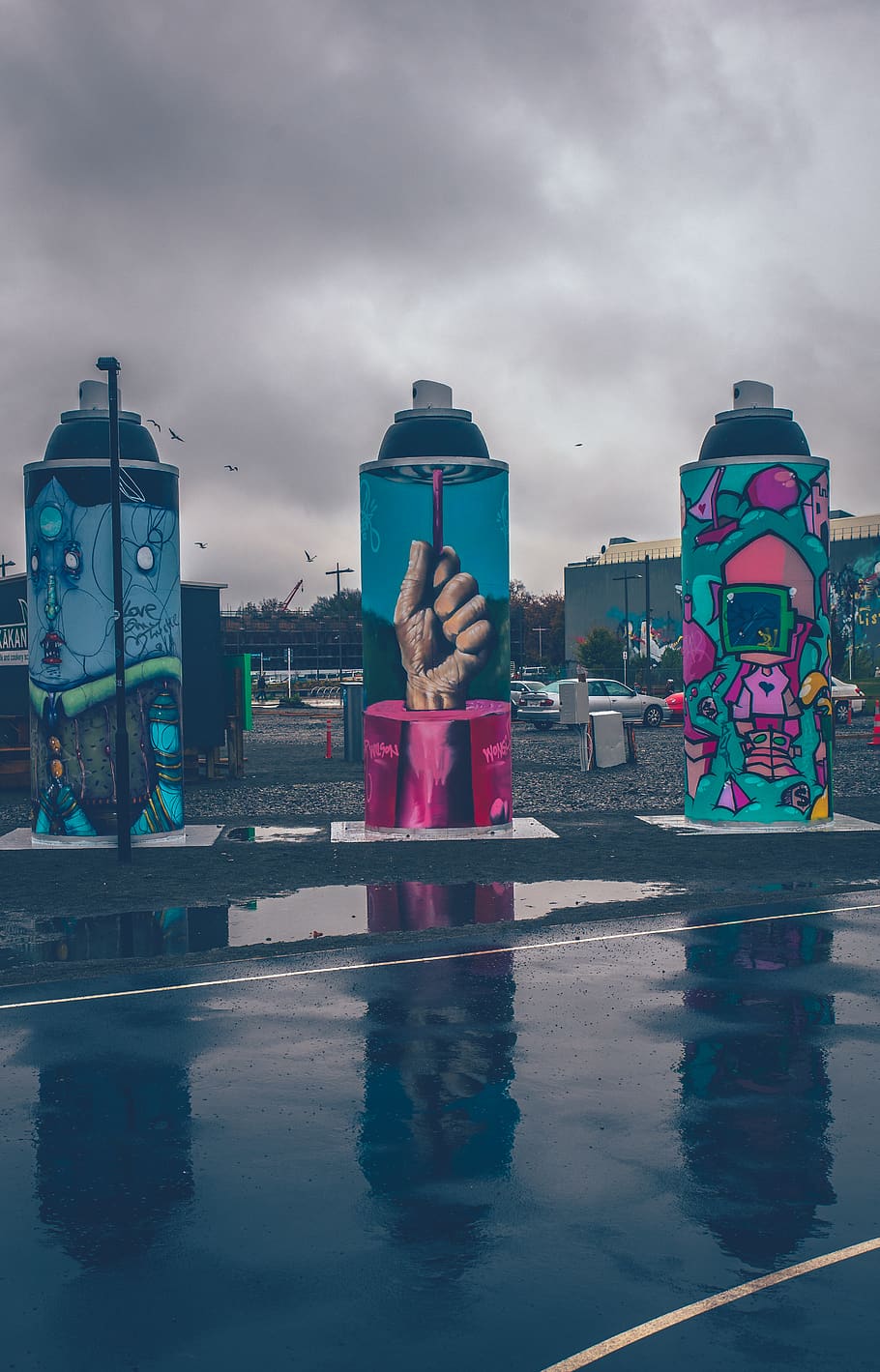 three spray bottle-themed statues beside roadway, graffiti, kiosk, HD wallpaper