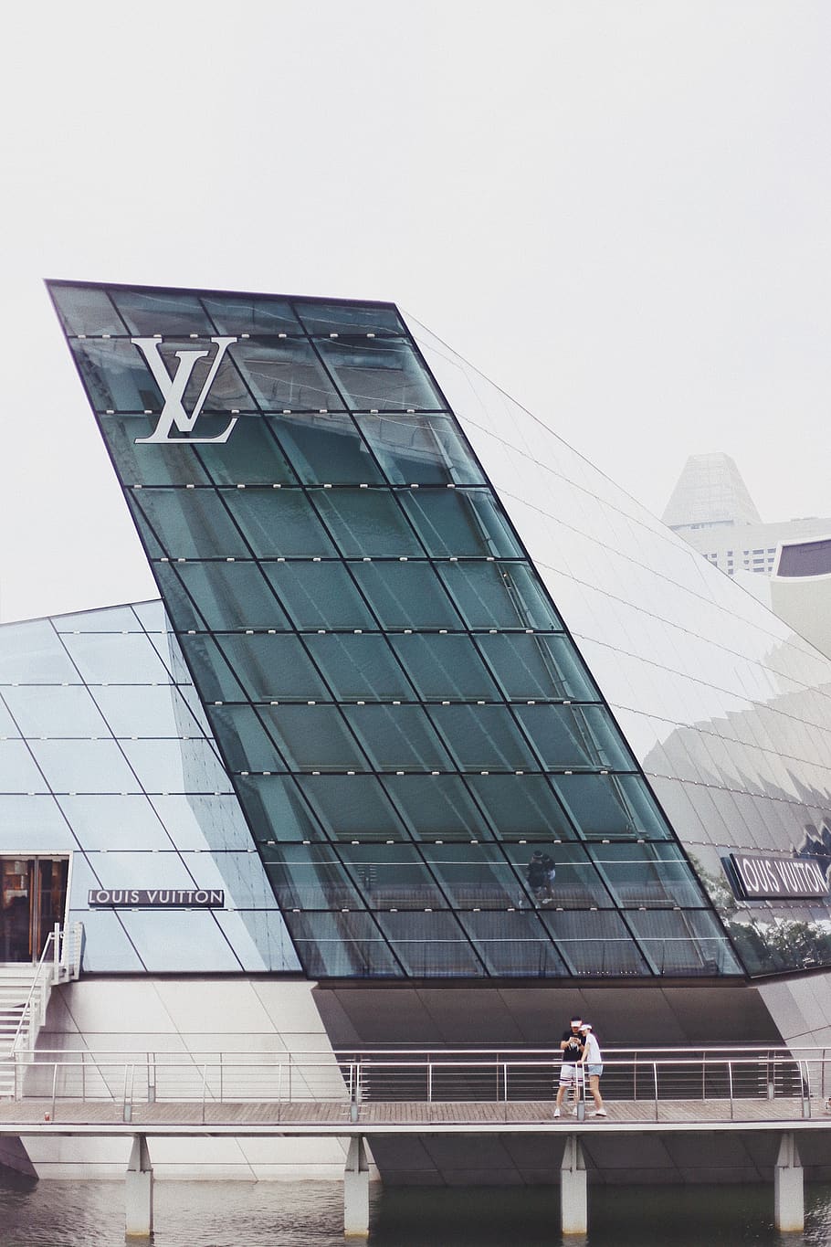 HD wallpaper: photo of Louis Vuitton building, white LV concrete building  near cars