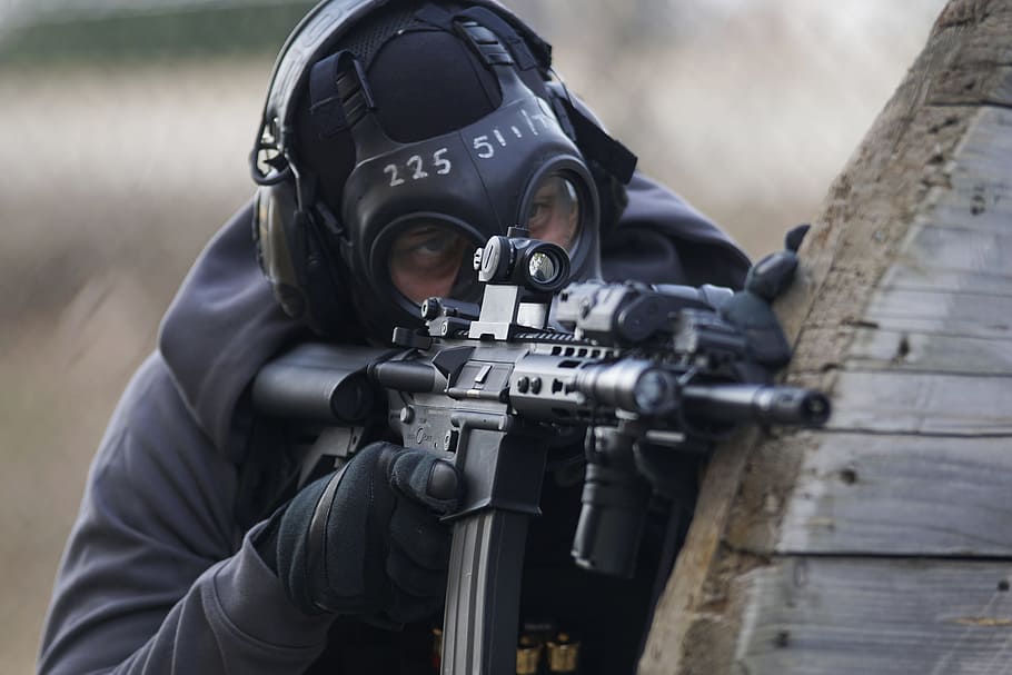 man, person, military, safety, action, armed, combat, gun, helmet HD wallpaper