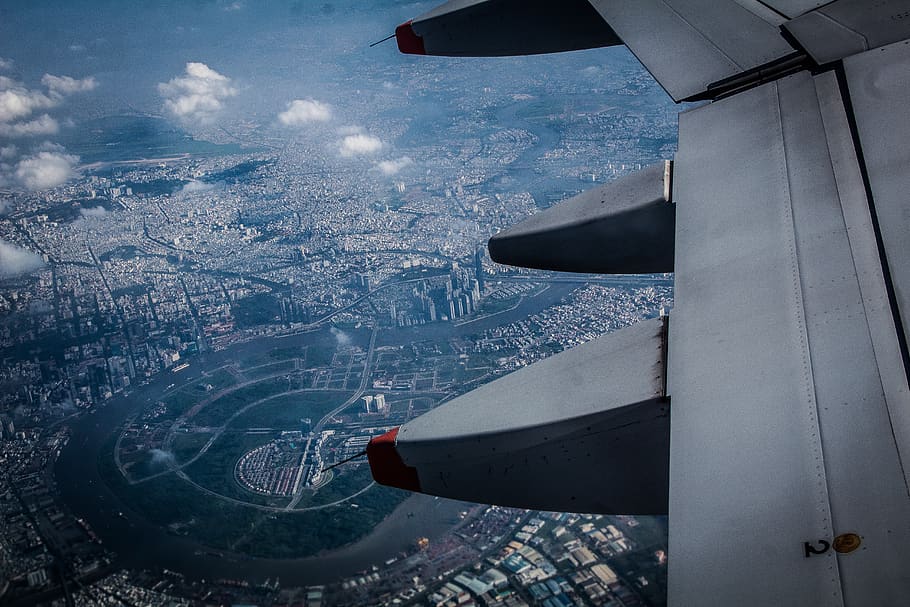 person inside plane taking photo of aerial view of city, airplane, HD wallpaper