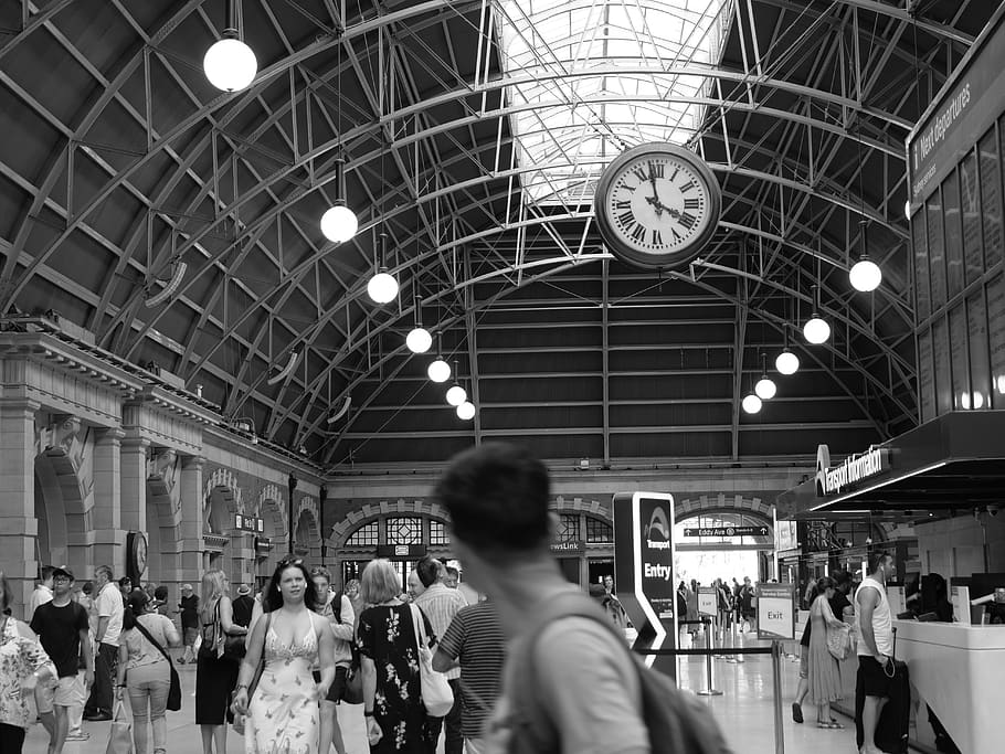 gray scale photo of people inside airport, human, person, apparel