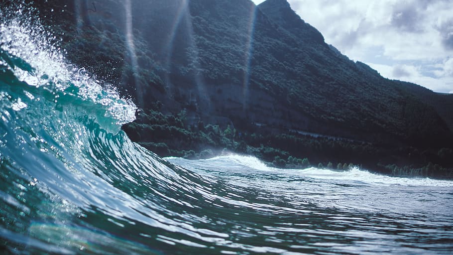waves near mountain, sea, surf, ocean, blue, water, shiny, sparkle, HD wallpaper