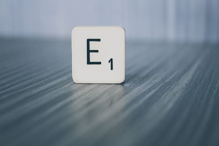 E1 scrabble tile, word, text, wood, sideboard, furniture, alphabet HD wallpaper