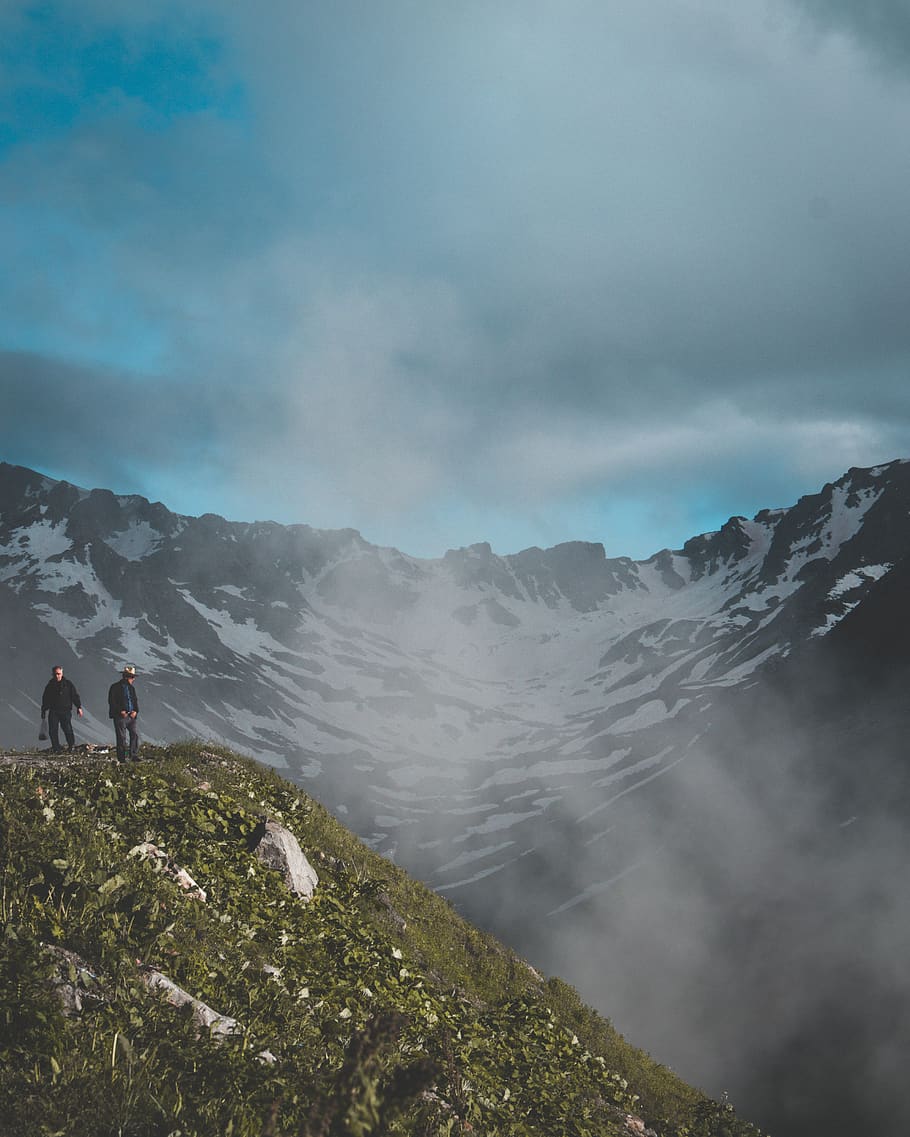 Two Men on Hill Near Snow Mountain, altitude, clouds, cloudy HD wallpaper