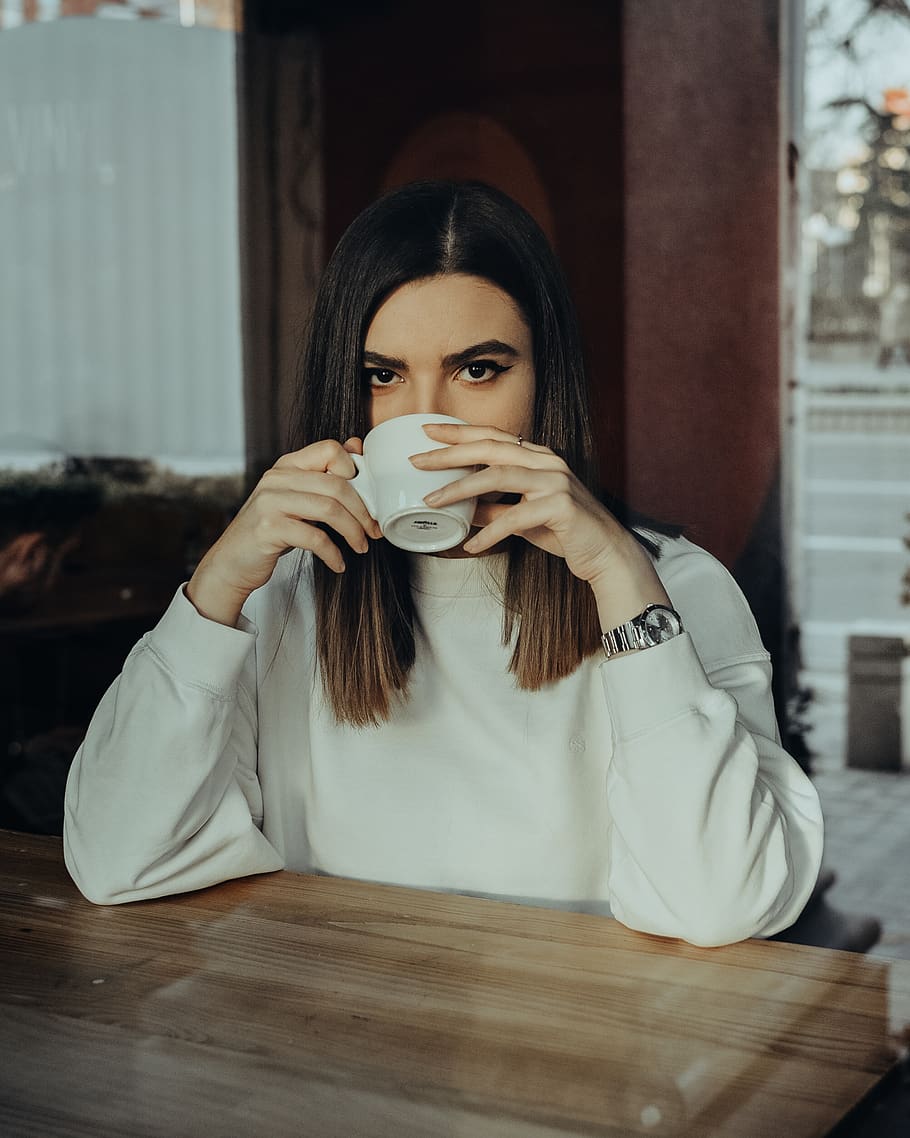 HD wallpaper: woman wearing white shirt drinking coffee, one person,  portrait | Wallpaper Flare