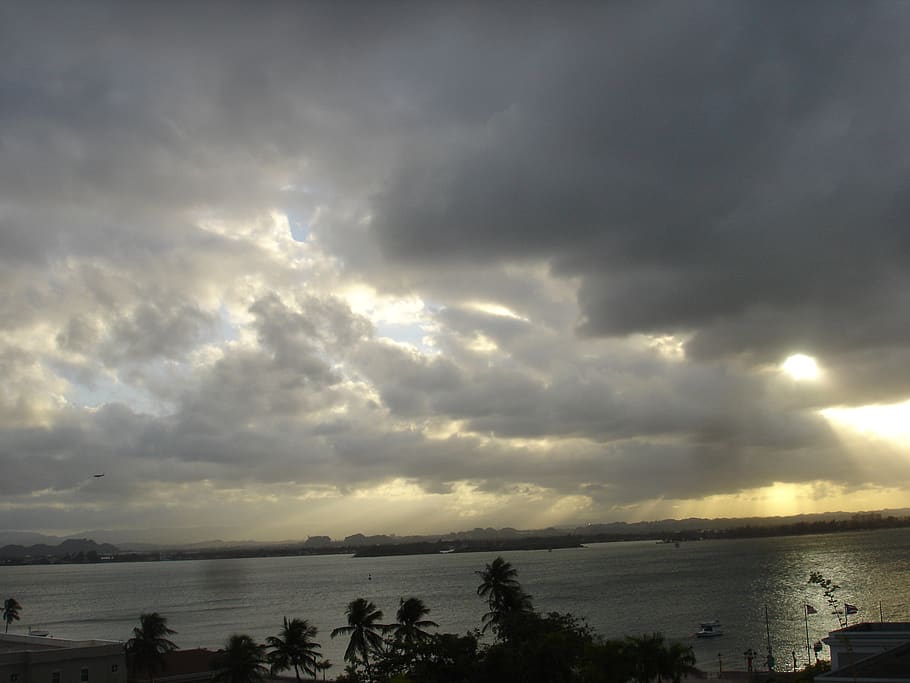 puerto rico, san juan, sundown, nature, sky, sun rays, nubes oscuras