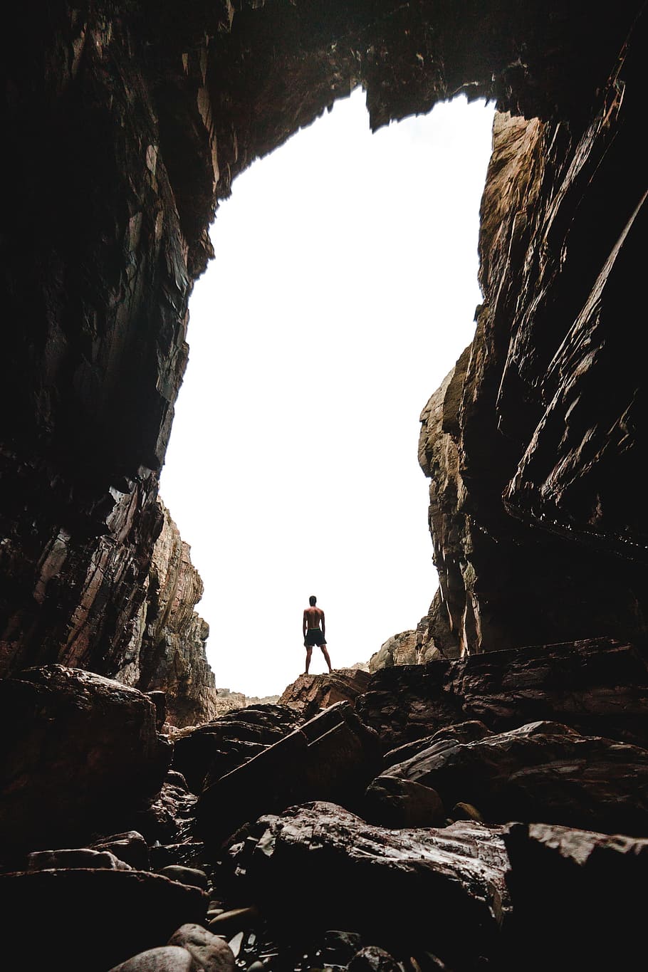 man standing on cave, landscape, minimal landscape, explore, male, HD wallpaper