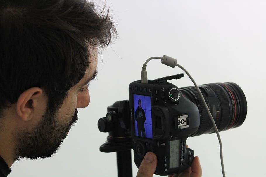 man using black DSLR camera, electronics, person, human, photo HD wallpaper