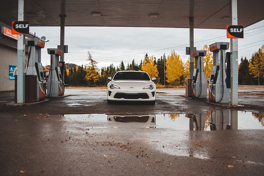 white vehicle parked on gasoline station, puddle, springdale, HD wallpaper