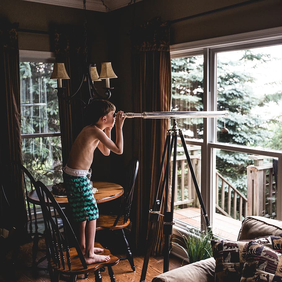 boy looking through telescope, real people, one person, lifestyles HD wallpaper