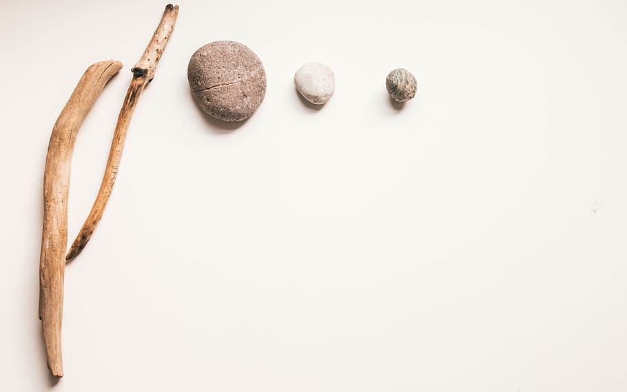 three brown stones on white surface, white background, studio shot HD wallpaper
