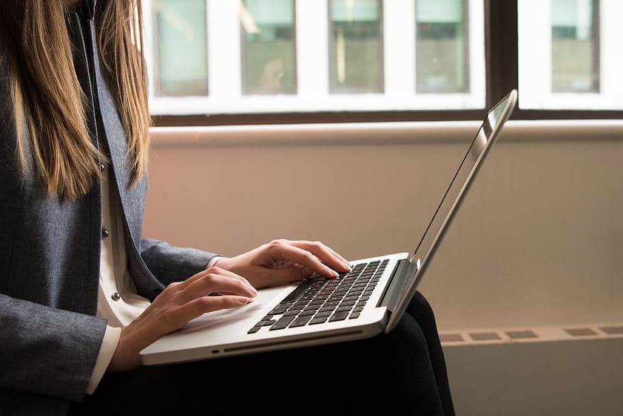 Woman Using Macbook Pro, access, business, chair, computer, connection HD wallpaper