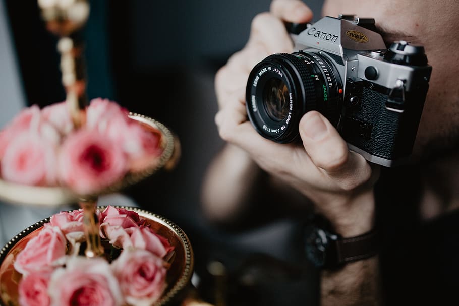 Young man taking photos, working, camera, photography, photographer HD wallpaper