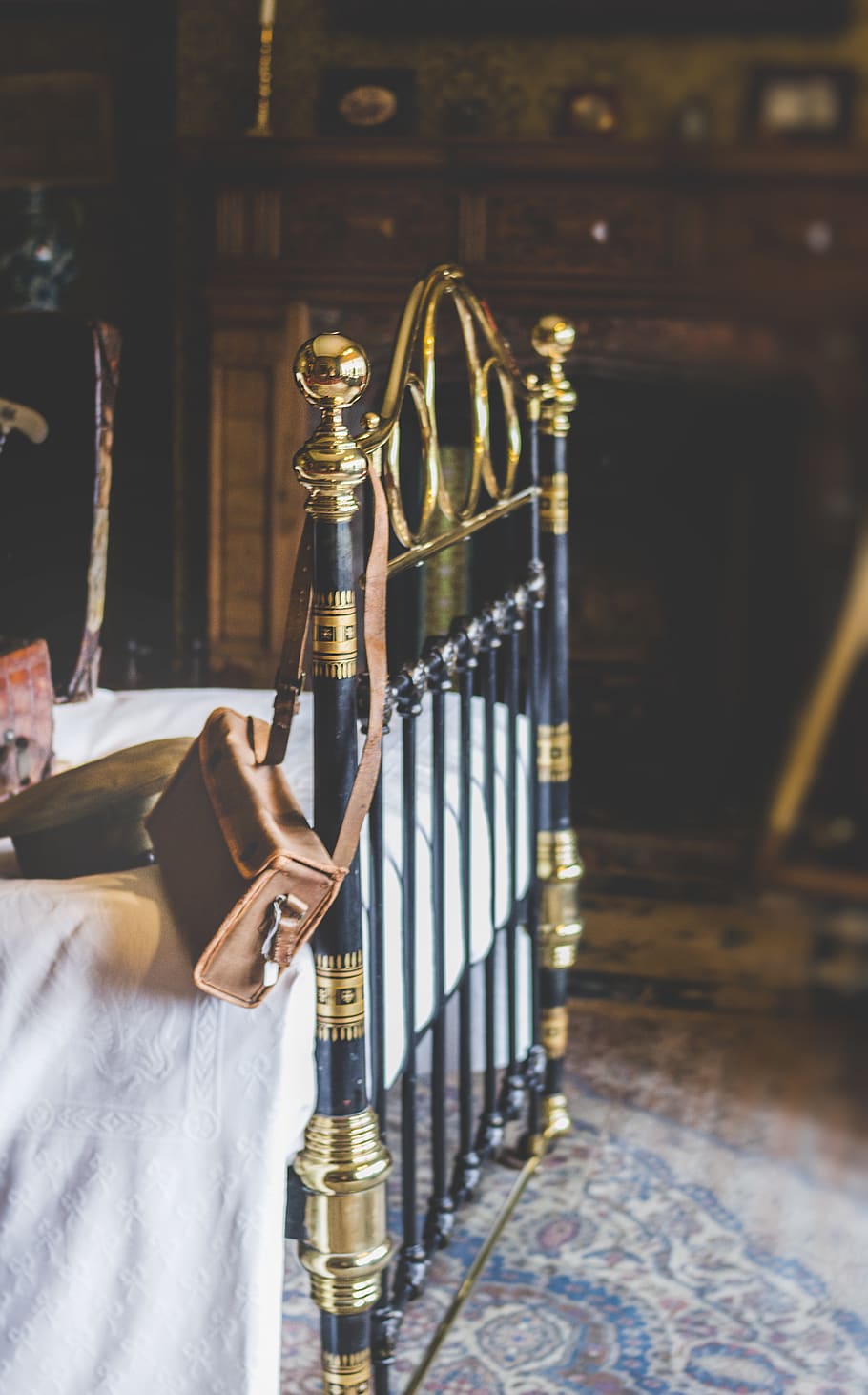 Brown Leather Crossbody Bag On Black And Gold Bed Frame, real people HD wallpaper