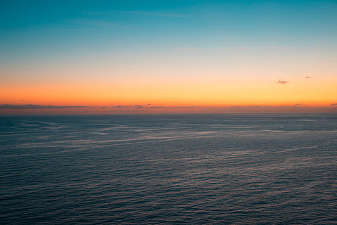 Beautiful Sunset over the Ocean, background, blue, calm, evening HD wallpaper
