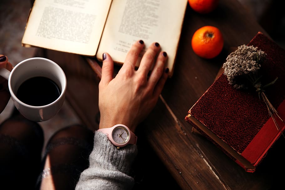Person Holding Cup of Coffee and Open Book, accessory, caffeine HD wallpaper