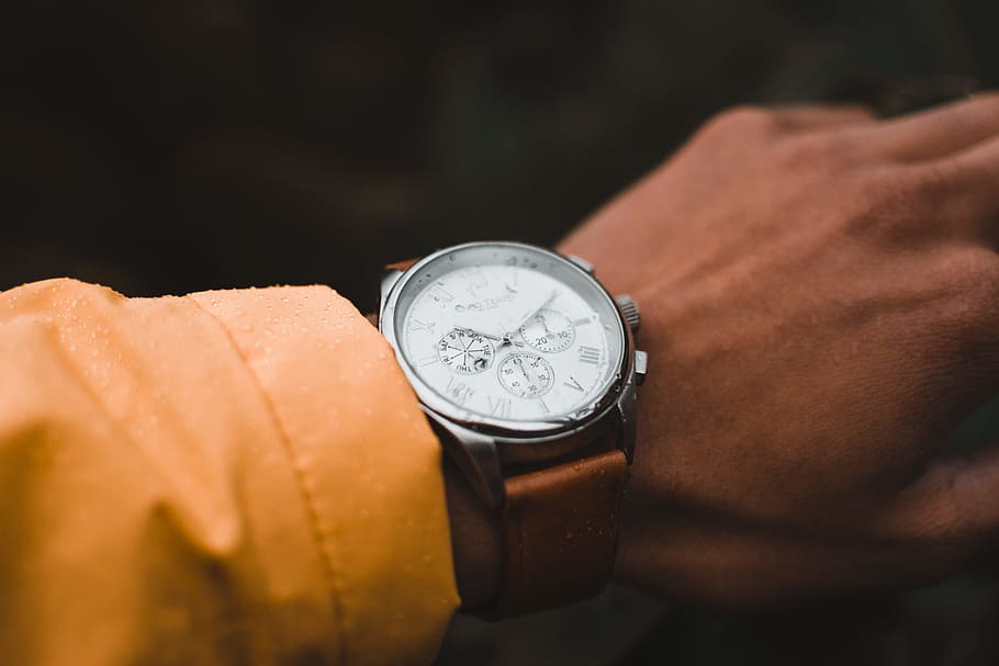 person wearing round silver-colored chronograph watch, pure, raw HD wallpaper