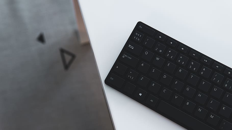 black wireless keyboard on white surface, hardware, computer hardware HD wallpaper