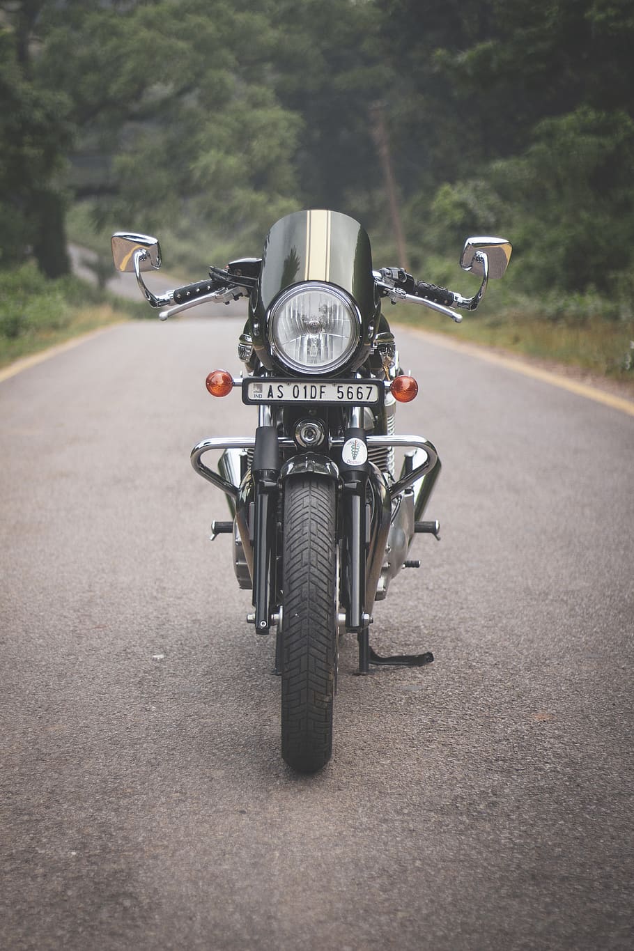 Photo of Motorcycle Parked On Road, asphalt, cafe racer, classic