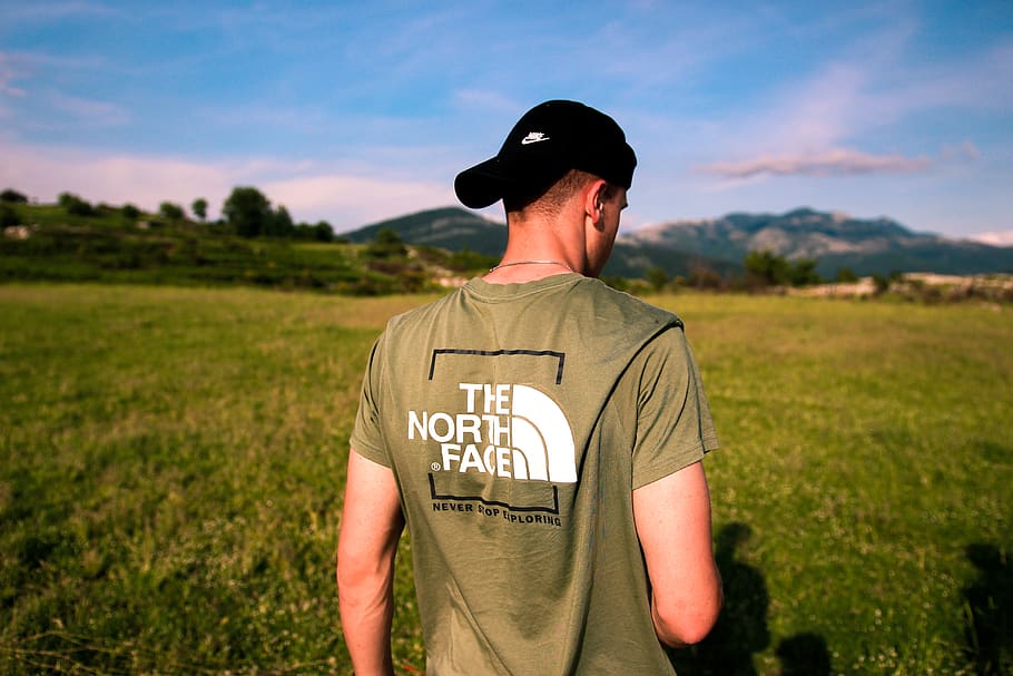 man in brown The North Face crew-neck shirt, clothing, apparel, HD wallpaper