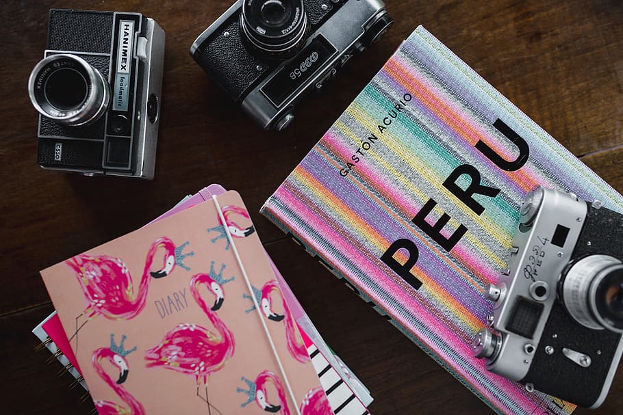 Old analog cameras and pink books on a wooden table, diary, flamingo HD wallpaper