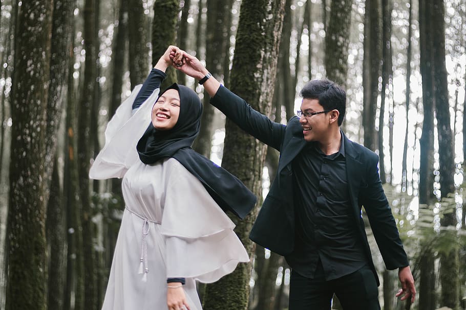Man and Woman Dancing Near Forest Trees While Smiling, beautiful HD wallpaper