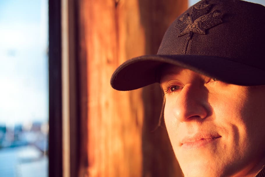 baseball cap, eyes, happy, maple leaf, smile, woman, gaze, sunset HD wallpaper