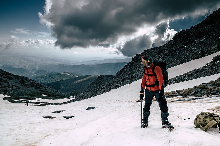 man wearing red jacket, person, human, people, mountain, outdoors HD wallpaper