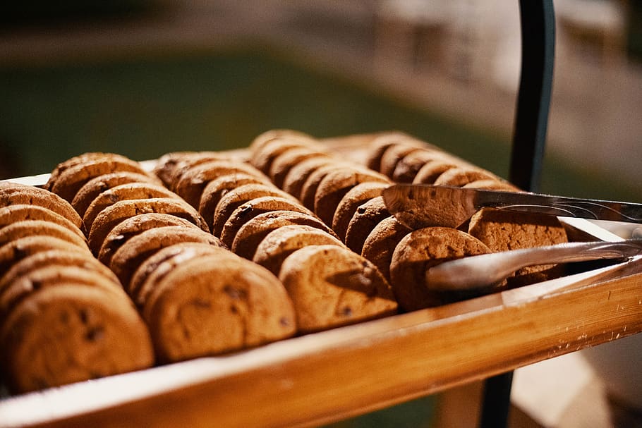 Selective Focus Photography of Baked Cookies With Gray Stainless Steel Tong HD wallpaper