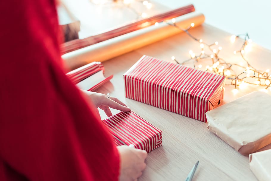 Woman Wrapping Christmas Presents, christmas decoration, christmas gifts