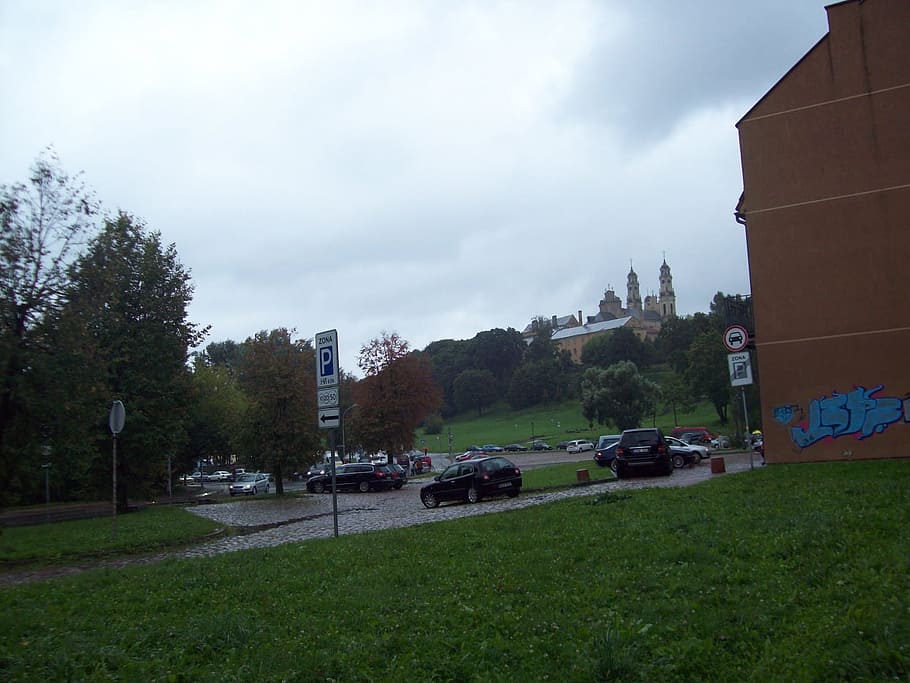 lithuania, vilnius, view, city, cars, nature, parkinglot, plant HD wallpaper