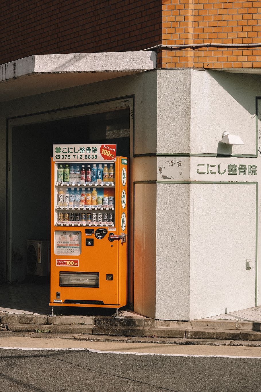 orange vending machine near building, urban, door, japan, street