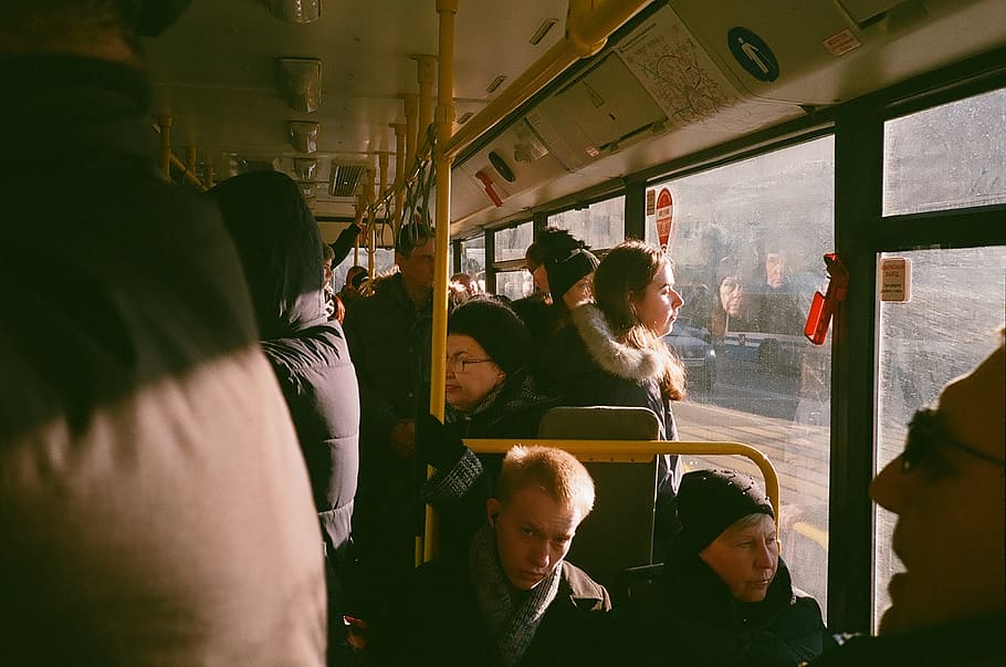 group of people inside the bus during daytime, person, human
