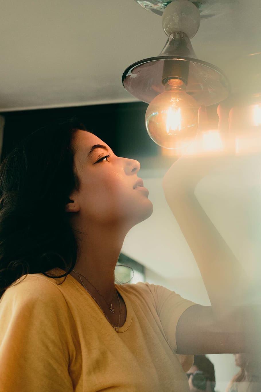 Woman Holding Light Bulb, illuminated, model, person, one person HD wallpaper