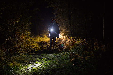 Person Holding Flashlight during Nighttime, backlit, clouds, dark HD wallpaper
